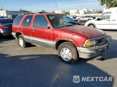 Czwarte zdjęcie samochodu z boku: 1996 GMC JIMMY VIN:1GKCS13W5T2576807 - miniatura