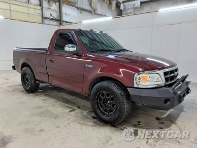 Czwarte zdjęcie samochodu z boku: 1997 FORD F150 VIN:1FTDF17W1VNB42495 - miniatura