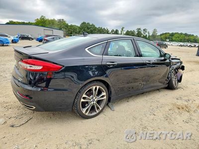 Trzecie zdjęcie samochodu z tyłu: 2020 FORD FUSION TITANIUM VIN:3FA6P0D96LR174924 - miniatura
