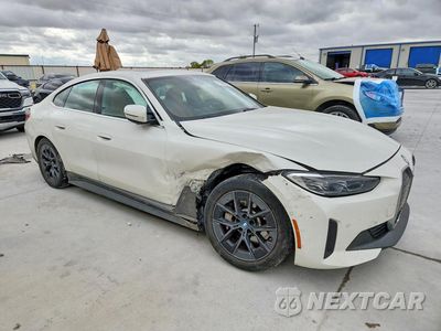 Czwarte zdjęcie samochodu z boku: 2024 BMW I4 EDRIVE 35 VIN:WBY43AW03RFS33630 - miniatura