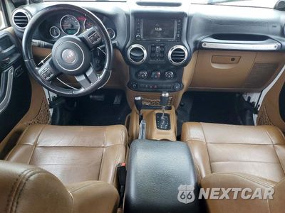 Zdjęcie 8 z 13 samochodu: 2012 JEEP WRANGLER UNLIMITED SAHARA VIN:1C4BJWEG1CL118754 - miniatura