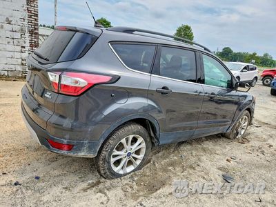 Trzecie zdjęcie samochodu z tyłu: 2018 FORD ESCAPE SE VIN:1FMCU9GD0JUD17460 - miniatura