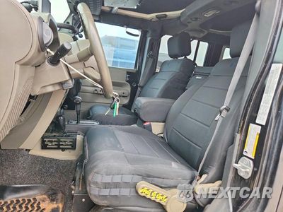 Zdjęcie 7 z 13 samochodu: 2009 JEEP WRANGLER UNLIMITED VIN:1J4GA69129L778705 - miniatura