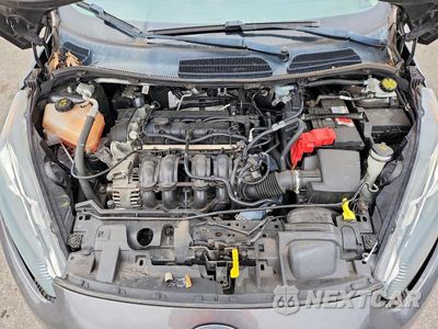 Zdjęcie 11 z 12 samochodu: 2018 FORD FIESTA TITANIUM VIN:3FADP4FJXJM105637 - miniatura