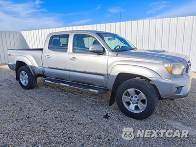Czwarte zdjęcie samochodu z boku: 2015 TOYOTA TACOMA DOUBLE CAB LONG BED VIN:5TFMU4FNXFX036505 - miniatura