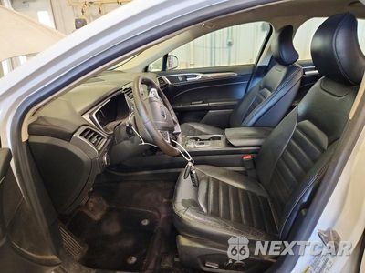 Zdjęcie 7 z 12 samochodu: 2017 FORD FUSION SE HYBRID VIN:3FA6P0LU9HR287263 - miniatura