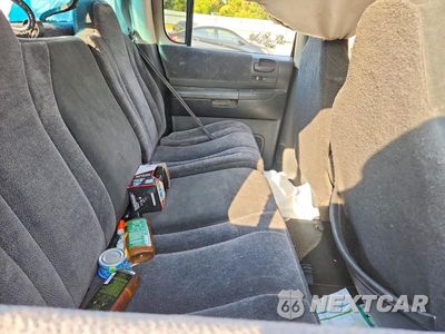 Zdjęcie 10 z 12 samochodu: 2004 DODGE DAKOTA QUAD SLT VIN:1D7HG48N34S691238 - miniatura