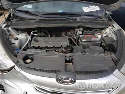 Zdjęcie 11 z 13 samochodu: 2012 HYUNDAI TUCSON GLS VIN:KM8JU3AC1CU487012 - miniatura