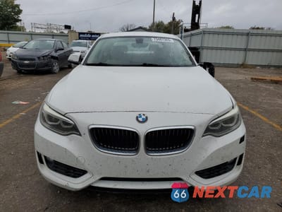 Piąte zdjęcie samochodu w środku: 2014 BMW 228 I VIN:WBA1F5C50EV255777 - miniatura