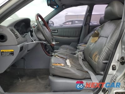 Zdjęcie 7 z 13 samochodu: 2004 KIA OPTIMA LX VIN:KNAGD128245336752 - miniatura