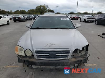 Piąte zdjęcie samochodu w środku: 2004 KIA OPTIMA LX VIN:KNAGD128245336752 - miniatura