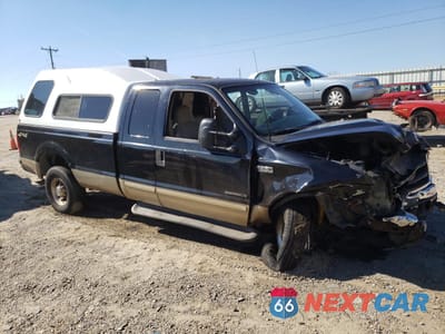 Czwarte zdjęcie samochodu z boku: 2001 FORD F250 SUPER DUTY VIN:1FTNX21F11EA06359 - miniatura