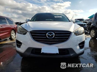 Piąte zdjęcie samochodu w środku: 2016 MAZDA CX-5 GT VIN:JM3KE2DY0G0799429 - miniatura
