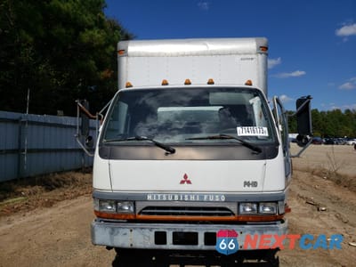 Piąte zdjęcie samochodu w środku: 2004 MITSUBISHI FUSO TRUCK OF AMERICA INC FE 649 VIN:JL6BBE1H14K011434 - miniatura