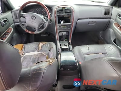 Zdjęcie 8 z 13 samochodu: 2004 KIA OPTIMA LX VIN:KNAGD128245336752 - miniatura