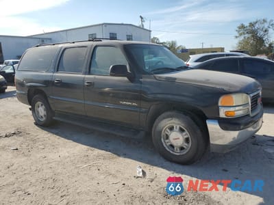 Czwarte zdjęcie samochodu z boku: 2001 GMC YUKON XL K1500 VIN:3GKFK16T31G209827 - miniatura