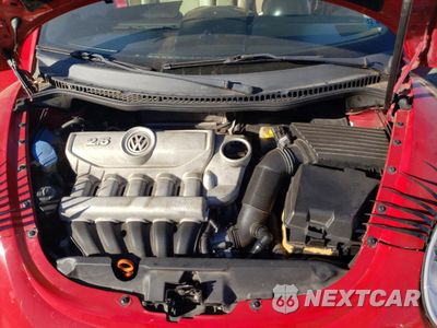 Zdjęcie 13 z 14 samochodu: 2008 VOLKSWAGEN NEW BEETLE CONVERTIBLE SE VIN:3VWRF31Y48M409216 - miniatura