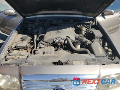 Zdjęcie 11 z 12 samochodu: 2002 FORD CROWN VICTORIA VIN:2FAFP73WX2X109672 - miniatura