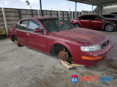 Czwarte zdjęcie samochodu z boku: 1996 NISSAN MAXIMA GLE VIN:JN1CA21D6TT735756 - miniatura