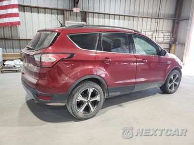 Trzecie zdjęcie samochodu z tyłu: 2018 FORD ESCAPE SEL VIN:1FMCU9HD2JUC76134 - miniatura