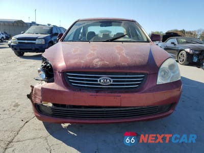 Piąte zdjęcie samochodu w środku: 2006 KIA OPTIMA LX VIN:KNAGE123565034229 - miniatura