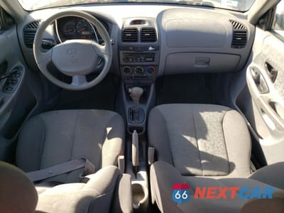 Zdjęcie 8 z 12 samochodu: 2005 HYUNDAI ACCENT GL VIN:KMHCG45C75U595637 - miniatura