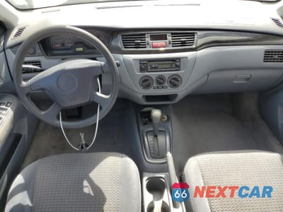 Zdjęcie 8 z 12 samochodu: 2002 MITSUBISHI LANCER ES VIN:JA3AJ26E32U082171 - miniatura