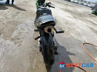 Czwarte zdjęcie samochodu z boku: 2003 HONDA CBR600 RR VIN:JH2PC37043M003520 - miniatura