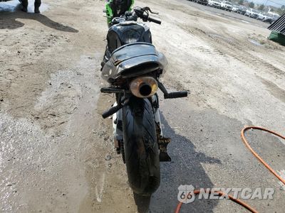 Czwarte zdjęcie samochodu z boku: 2003 HONDA CBR600 RR VIN:JH2PC37043M003520 - miniatura
