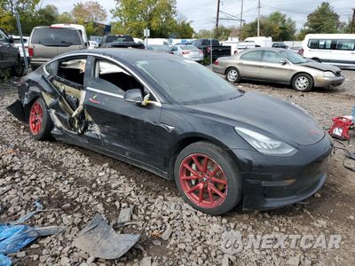 Czwarte zdjęcie samochodu z boku: 2019 TESLA MODEL 3 VIN:5YJ3E1EAXKF395556 - miniatura