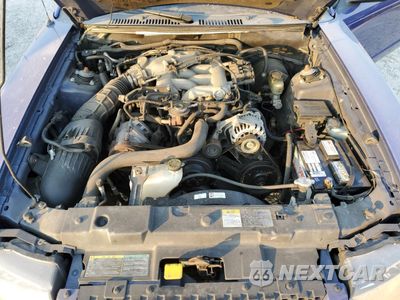 Zdjęcie 11 z 13 samochodu: 2003 FORD MUSTANG VIN:1FAFP40443F334684 - miniatura