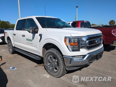 Czwarte zdjęcie samochodu z boku: 2021 FORD F150 SUPERCREW VIN:1FTFW1E59MFC12417 - miniatura