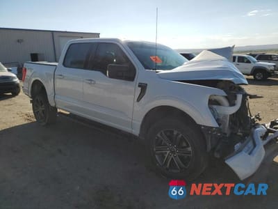 Czwarte zdjęcie samochodu z boku: 2021 FORD F150 SUPERCREW VIN:1FTFW1E86MKD90707 - miniatura