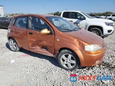 Czwarte zdjęcie samochodu z boku: 2006 CHEVROLET AVEO BASE VIN:KL1TD66626B632048 - miniatura