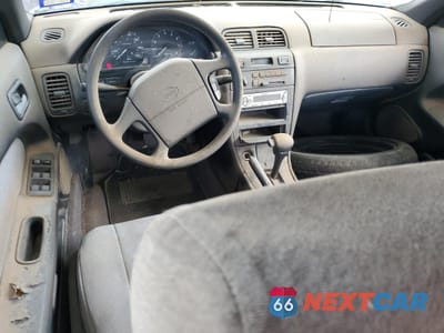 Zdjęcie 8 z 12 samochodu: 1996 NISSAN MAXIMA GLE VIN:JN1CA21D6TT735756 - miniatura