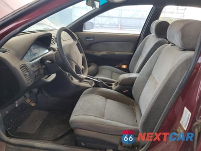 Zdjęcie 7 z 12 samochodu: 1996 NISSAN MAXIMA GLE VIN:JN1CA21D6TT735756 - miniatura