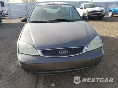 Piąte zdjęcie samochodu w środku: 2005 FORD FOCUS ZX5 VIN:3FAFP37N45R104867 - miniatura