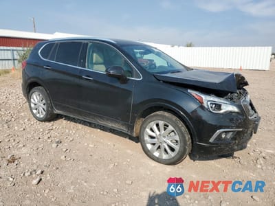 Czwarte zdjęcie samochodu z boku: 2016 BUICK ENVISION PREMIUM VIN:LRBFXESX3GD190150 - miniatura