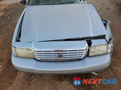 Zdjęcie 12 z 13 samochodu: 2004 FORD CROWN VICTORIA LX VIN:2FAHP74W84X151316 - miniatura