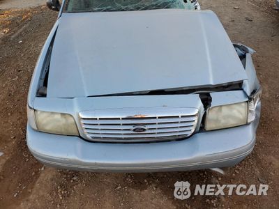 Zdjęcie 12 z 13 samochodu: 2004 FORD CROWN VICTORIA LX VIN:2FAHP74W84X151316 - miniatura