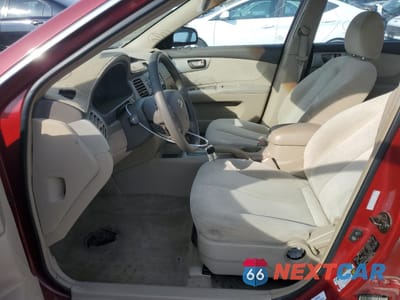 Zdjęcie 7 z 14 samochodu: 2006 KIA OPTIMA LX VIN:KNAGE123565034229 - miniatura