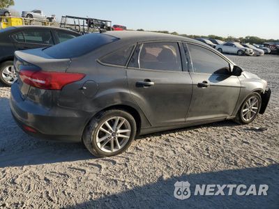 Trzecie zdjęcie samochodu z tyłu: 2017 FORD FOCUS SE VIN:1FADP3FEXHL342881 - miniatura