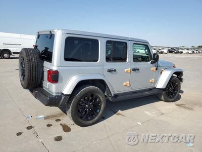 Trzecie zdjęcie samochodu z tyłu: 2022 JEEP WRANGLER UNLIMITED SAHARA 4XE VIN:1C4JJXR6XNW178567 - miniatura