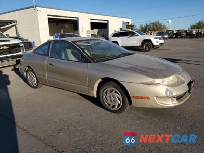Czwarte zdjęcie samochodu z boku: 1998 SATURN SC1 VIN:1G8ZE1283WZ270422 - miniatura