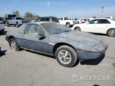 Czwarte zdjęcie samochodu z boku: 1986 PONTIAC FIERO SPORT VIN:1G2PM37R2FP239143 - miniatura