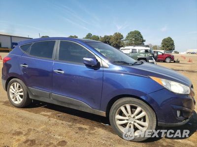 Czwarte zdjęcie samochodu z boku: 2012 HYUNDAI TUCSON GLS VIN:KM8JUCAC6CU342998 - miniatura