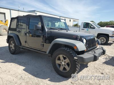 Czwarte zdjęcie samochodu z boku: 2011 JEEP WRANGLER UNLIMITED RUBICON VIN:1J4HA6H18BL604388 - miniatura