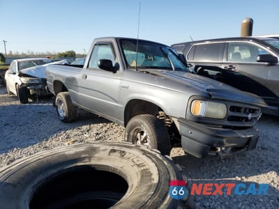 Czwarte zdjęcie samochodu z boku: 1994 MAZDA B2300 VIN:4F4CR12A4RTM61672 - miniatura