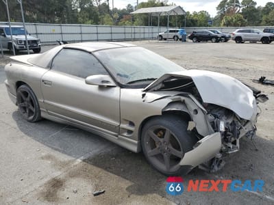 Czwarte zdjęcie samochodu z boku: 1999 PONTIAC FIREBIRD VIN:2G2FS22KXX2235243 - miniatura