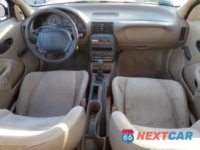 Zdjęcie 8 z 12 samochodu: 1998 SATURN SC1 VIN:1G8ZE1283WZ270422 - miniatura